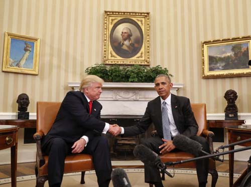 FILE - In this Thursday, Nov. 10, 2016 file photo, President Barack Obama and President-elect Donald Trump shake hands following their meeting in the Oval Office of the White House in Washington. As president-elect, Trump is calling for unity in words that draw attention precisely because they sound so unlike Trump, the candidate. But many question whether it is possible to reverse the campaigns damage to political discourse and its ripples out to the way Americans speak to and about each other. (AP Photo/Pablo Martinez Monsivais)